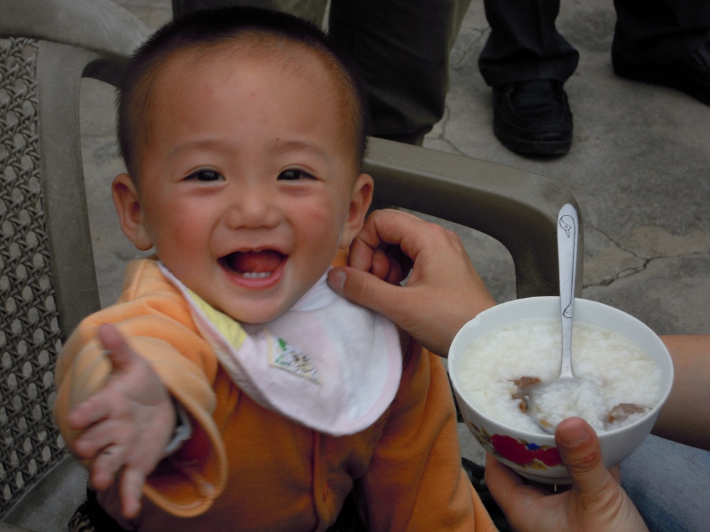 One of the few kids still staying in the Bao <b>Shan Stone</b> Village. Will he - baby-boy1